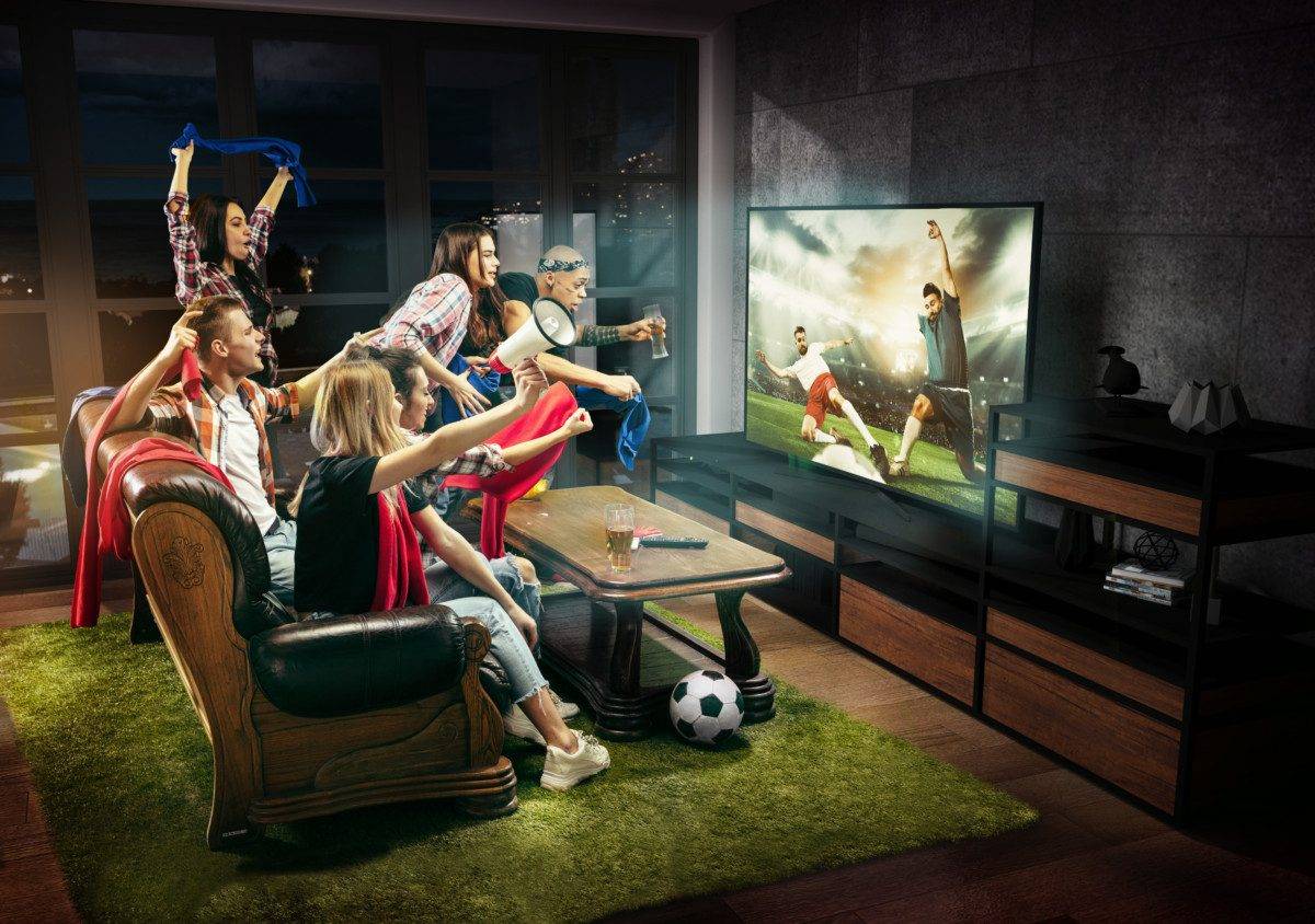Group of friends watching TV, match, sport games